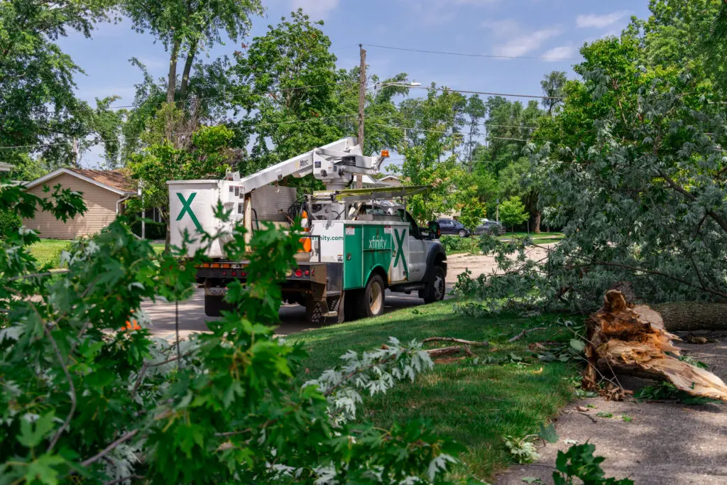 Xfinity bucket truck working in Helene storm response neighborhood.