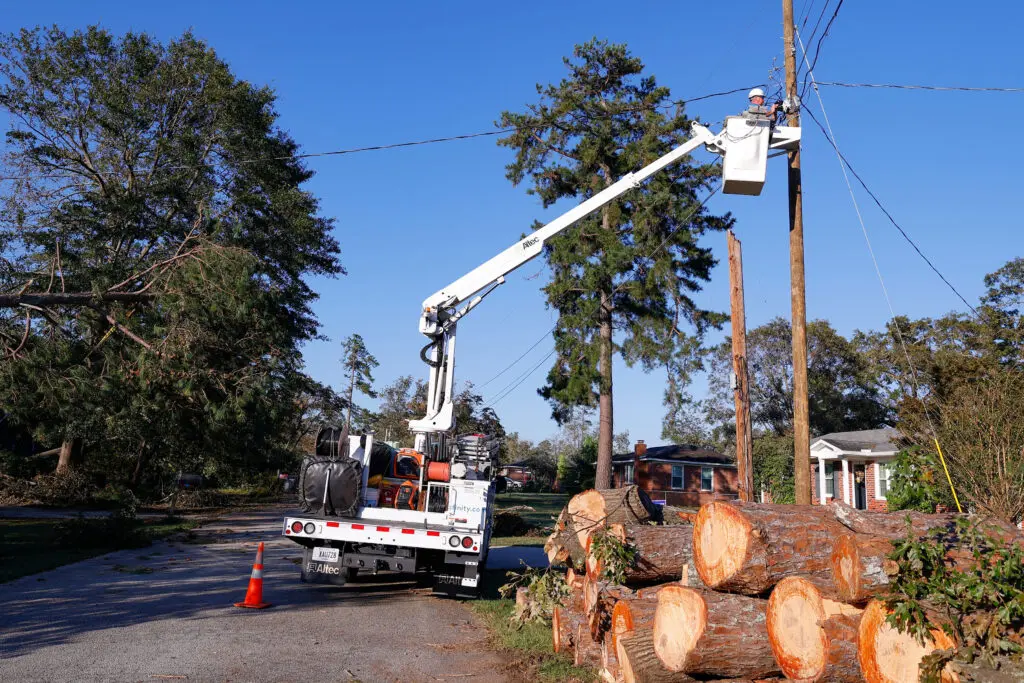 Comcast techs repair damaged lines caused by Hurricane Helene on Wednesday, Oct. 2, 2024 in Augusta. (Todd Kirkland/AP Content Services for Comcast)