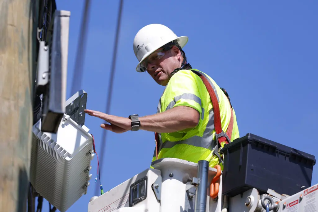 Comcast techs assess damaged lines caused by severe weather.