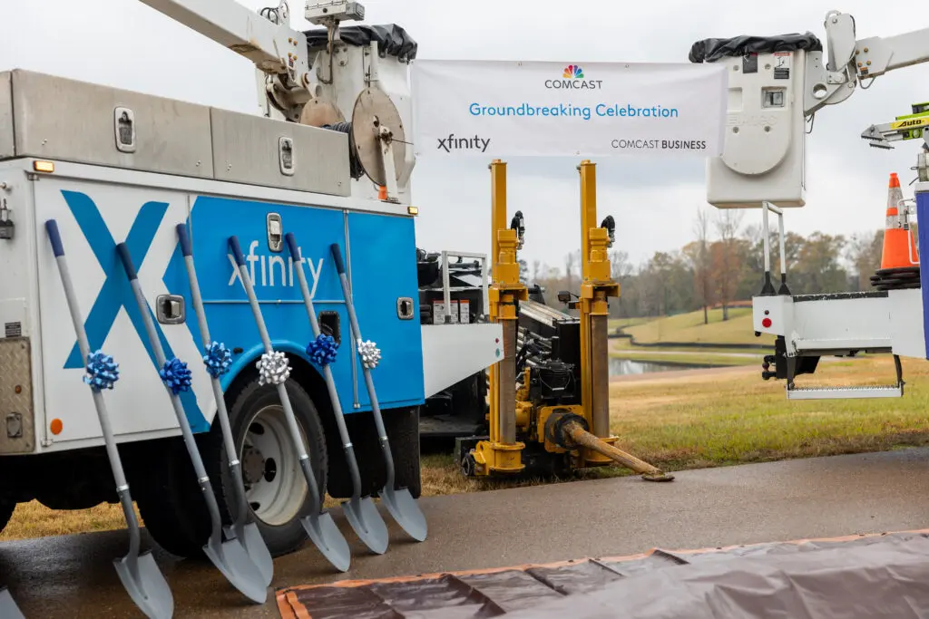 Xfinity trucks staged for ground breaking presentation in Madison County, Mississippi.