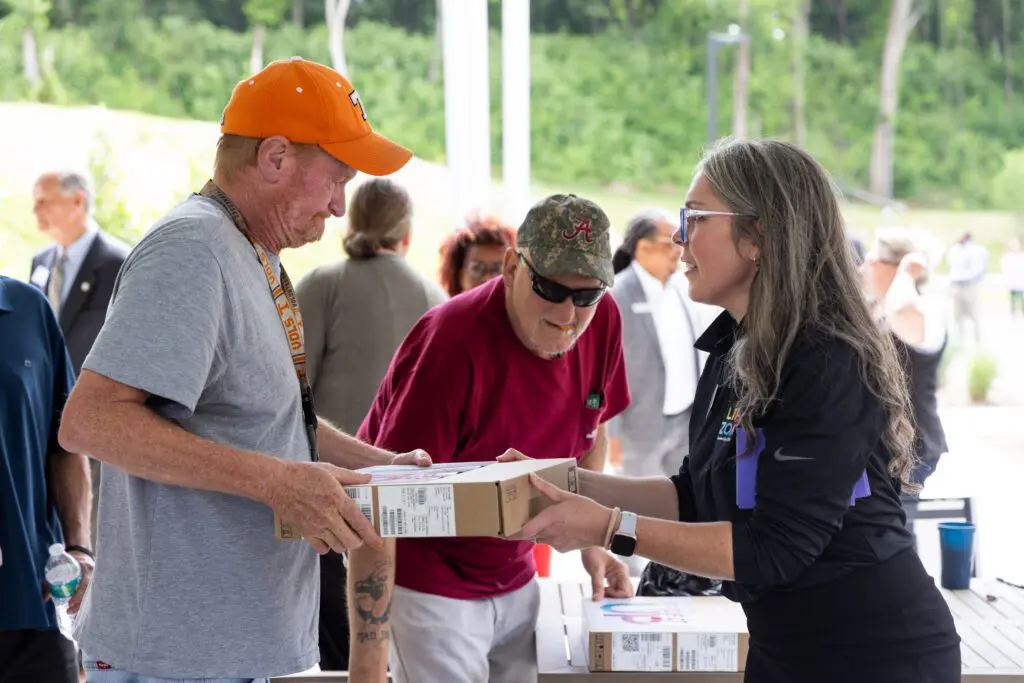 Veteran receives a laptop at Comcast Lift Zone in Knoxville