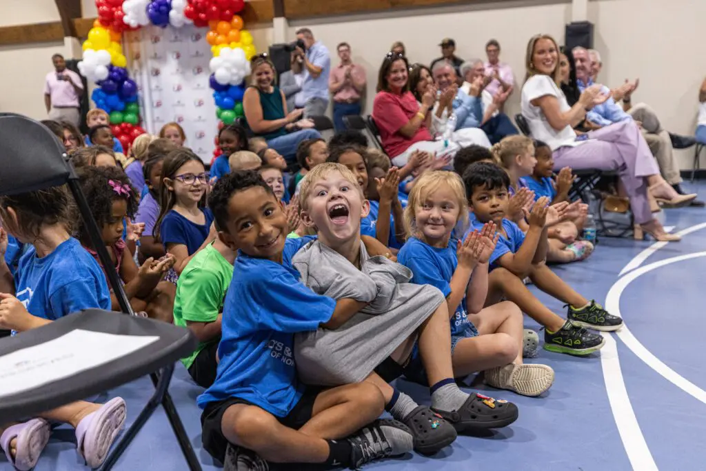 Children at laptop giveaway