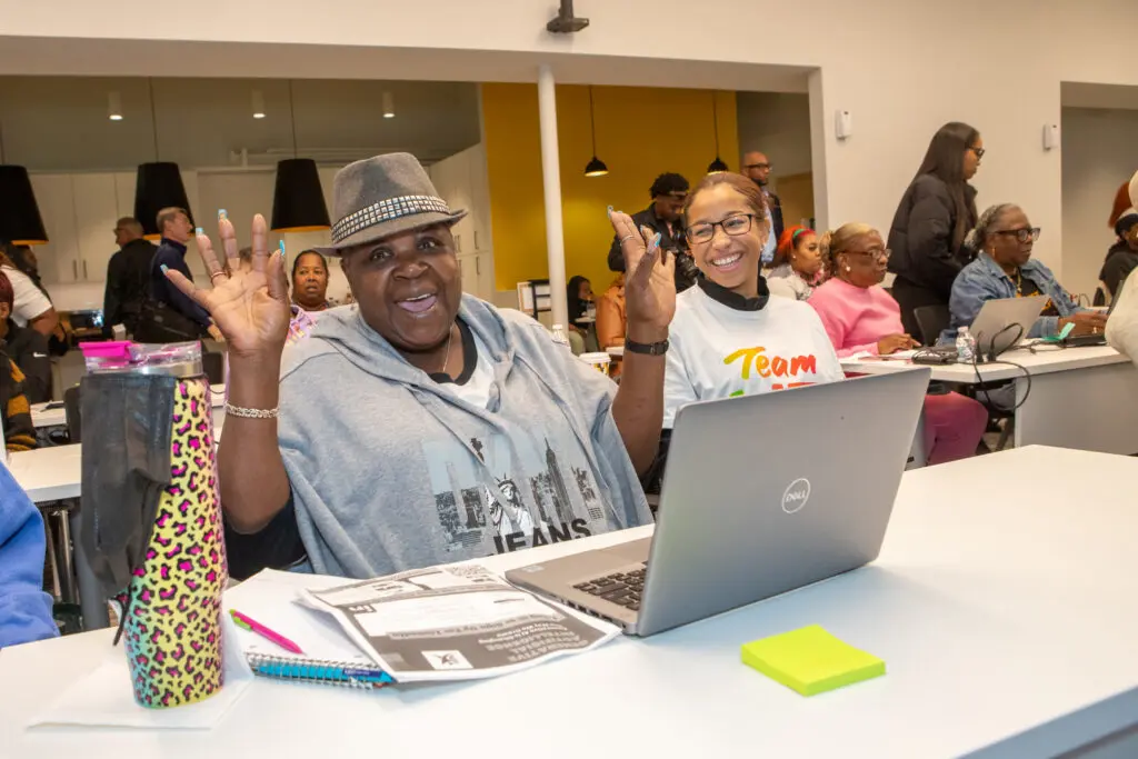 Group learning session focused on digital literacy and technology training at Inspiredu in Atlanta Georgia.