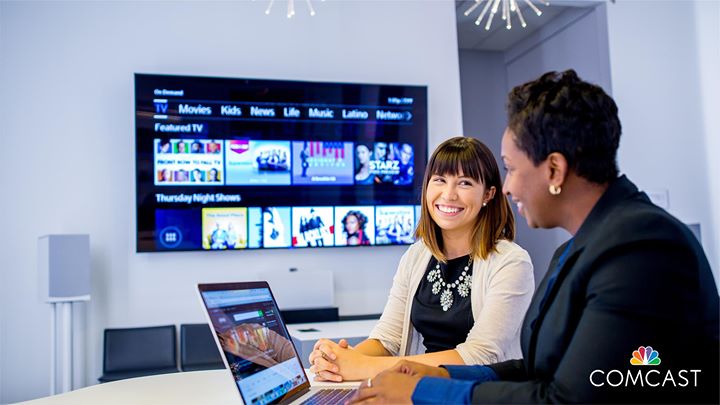 Women using a computer in an office setting