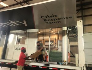 Xfinity Crisis Response Team truck distributing supplies.