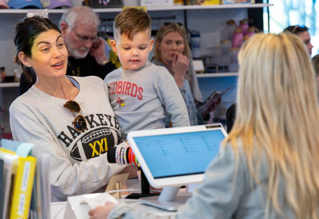 Families enjoying afternoon treats hosted by Comcast Business at Wanna Spoon Cereal Bar in Nashville, Tennessee.