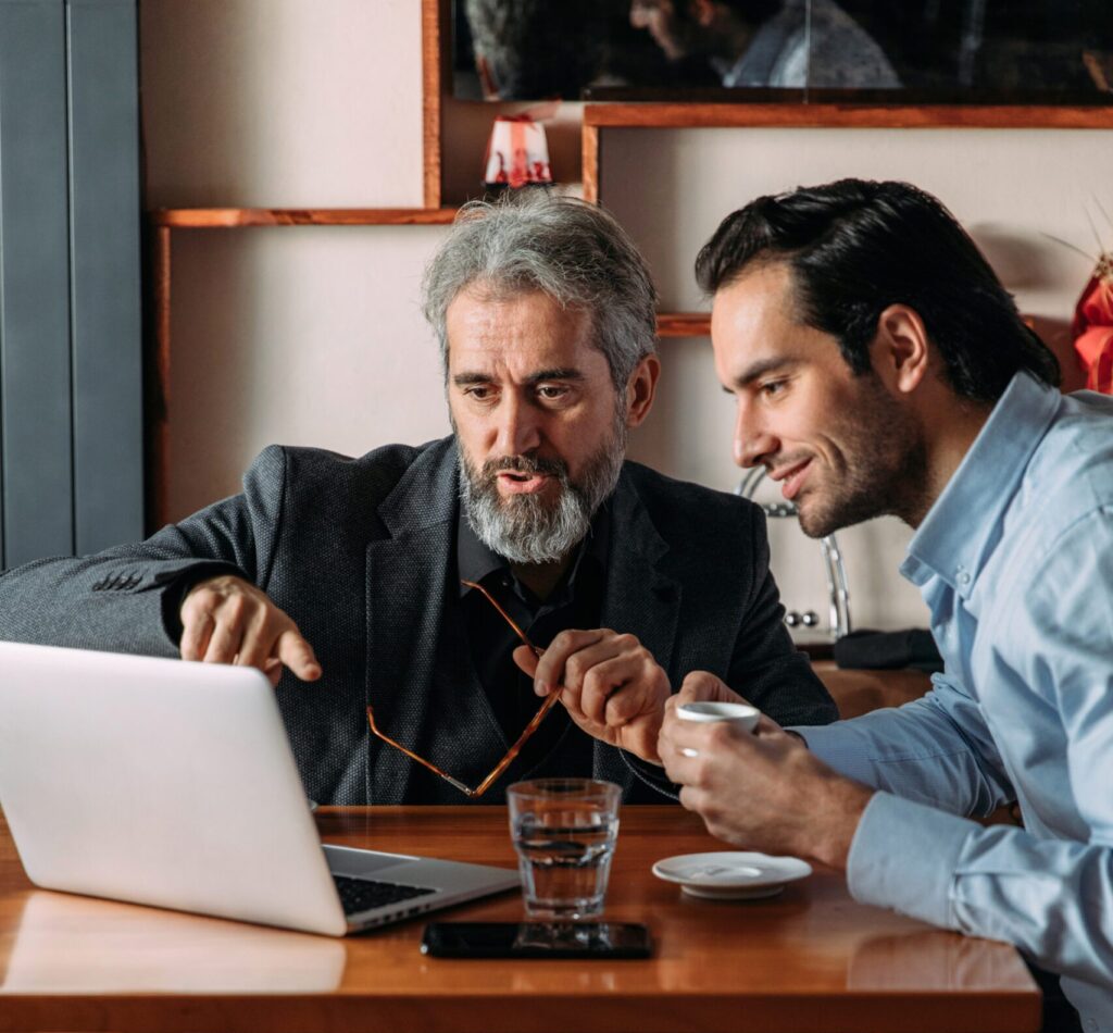 Men working at a desk