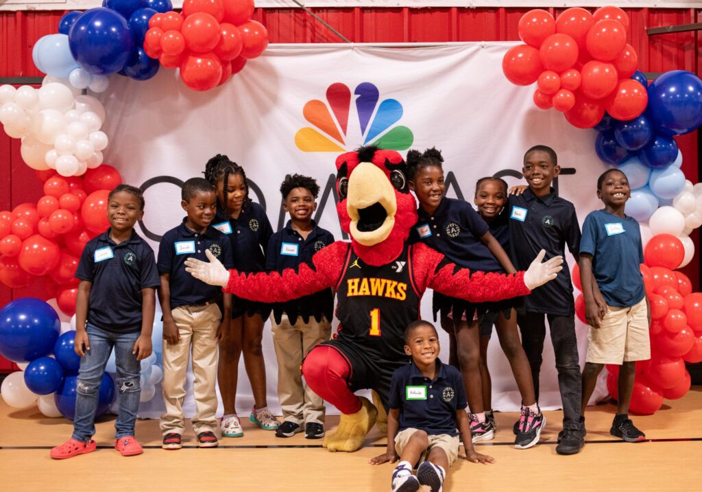 In addressing the digital divide, the team brought together students to celebrate the joy of the Olympic games and then receive free laptops to take home to their families.