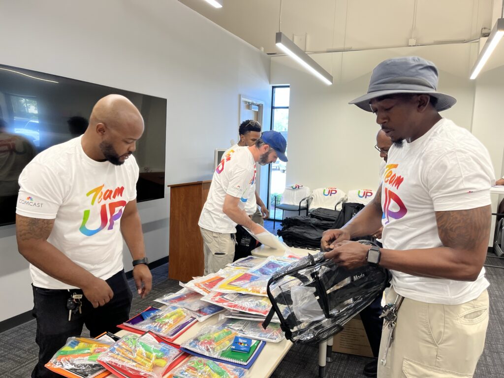 Volunteers stuff backpacks in Jackson, MS
